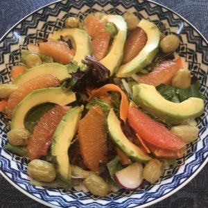 Salad with oranges, carrots, avocado