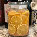 Image of preserved lemon slices in a jar of salt and water