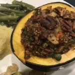 Image of an acorn squash with quinoa stuffing
