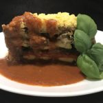 Image of stacked lasagna with polenta
