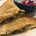 Image of spinach pie in a flaky crust