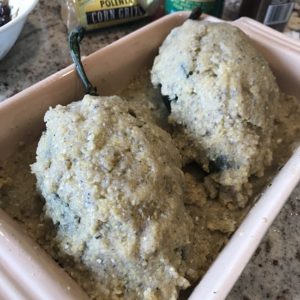 Image of Masa dough crusted peppers before baking