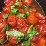 Image of roasted campari tomatoes with basil