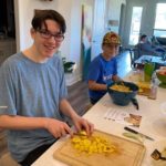 Image of my grandsons in the kitchen