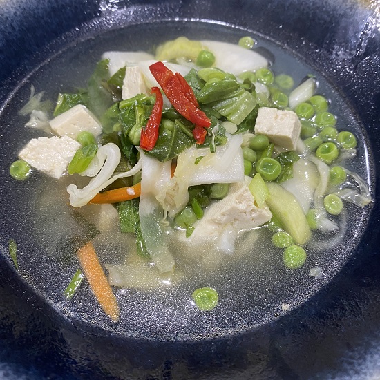 Image of miso soup with mixed greens and tofu