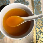 Image of a clear amber dashi broth