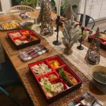 Image of a table set with bento box meals