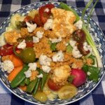 Image of salad with buffalo cauliflower bits