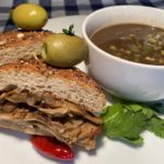 Image of a French dip sandwich with mushroom Jus